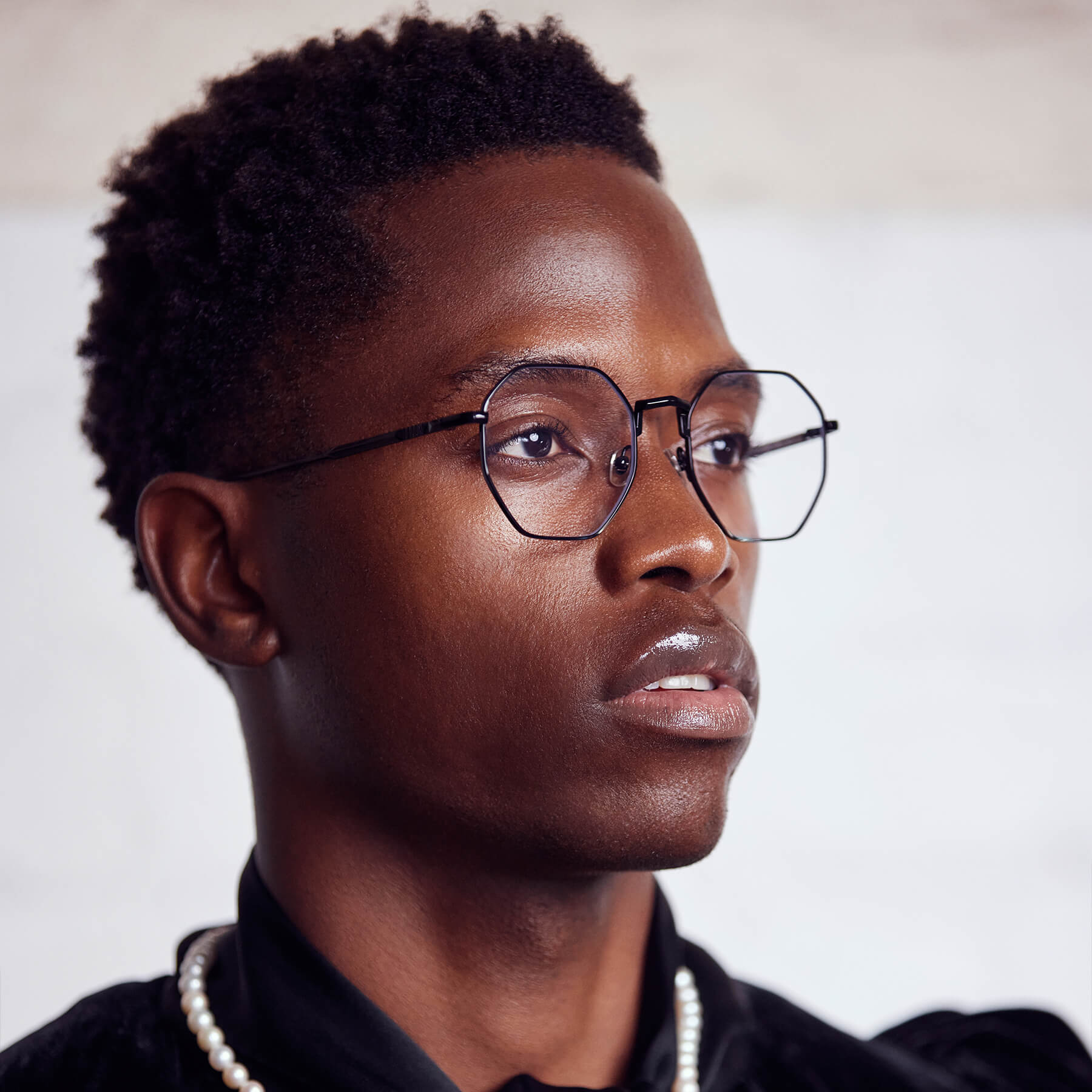 EyeGlasses Shop 36 EyeGlasses Shop -EyeGlasses Shop orb matteblacktitanium clear onmodel 02